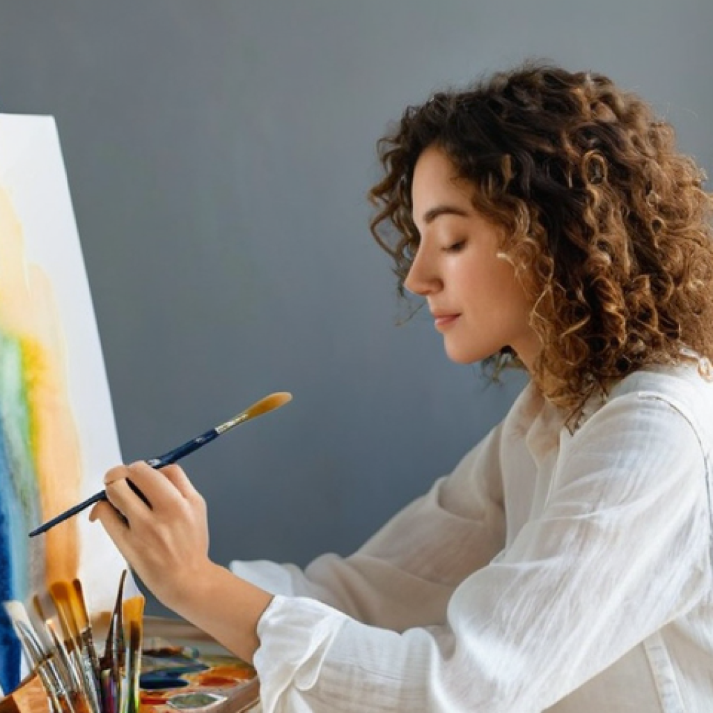 정신건강과 예술의 관계 탐구 - **"Serene Abstract Expression"**: A woman in her late 20s, with short, curly brown hair, sits comfor...